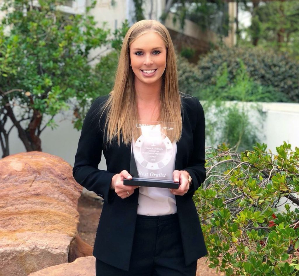 Rebecca Quade with Best Oral Advocate Award in Vegas